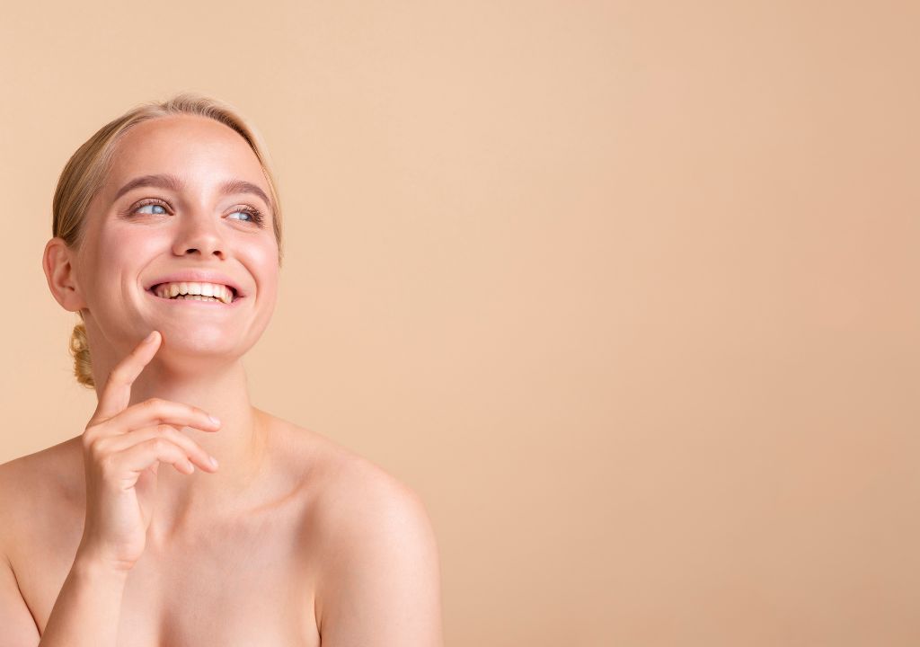 Smiling girl with flawless skin