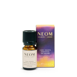 Neom Cosy Nights essential oil blend bottle and packaging on a white background