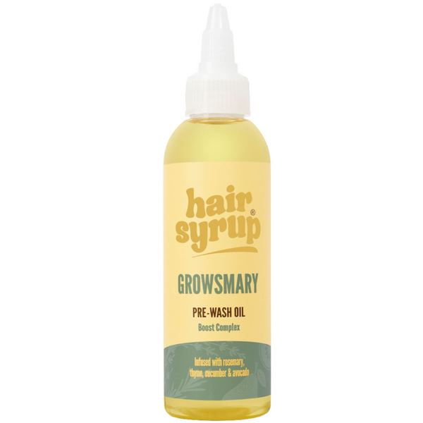 Bottle of hair syrup pre-wash oil with a yellow label on a white background