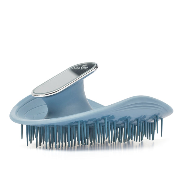 A light blue T3G Detangling Hairbrush with a silver metallic accent on the handle, shown on a clean white background.