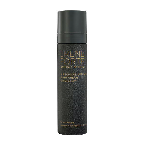 Black skincare bottle with gold text on a white background
