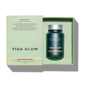 Vida Glow supplement bottle in a green box on a white background