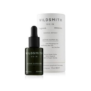 Dark green Wildsmith Skin Active Super Oil 30ml bottle next to white box