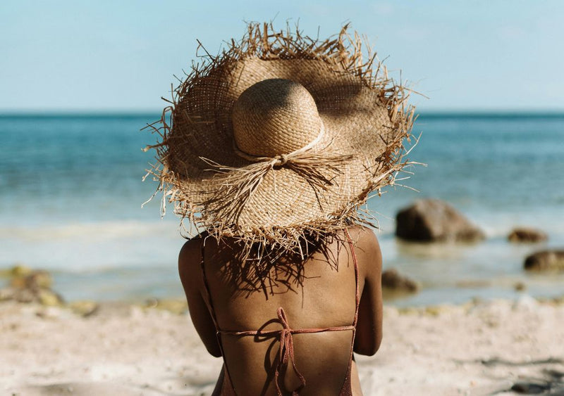 lady sunbathing at the beach