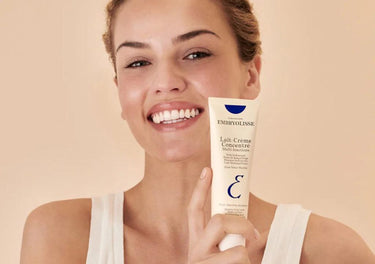 Lady holding Embryolisse sensitive skin moisturiser