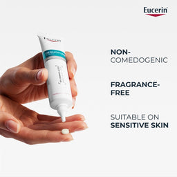 Eucerin Dermovit C+P cream being applied to a hand with product details on a white background