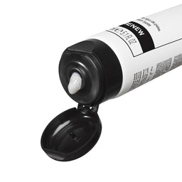 Open tube of Renew cream with visible cream inside on a white background