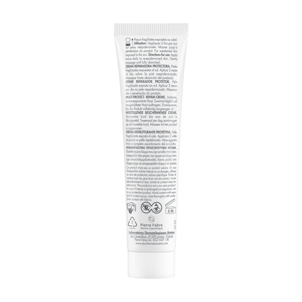 The back of a white squeeze tube of hair product, featuring detailed Spanish text, icons, and logos on a plain white background.