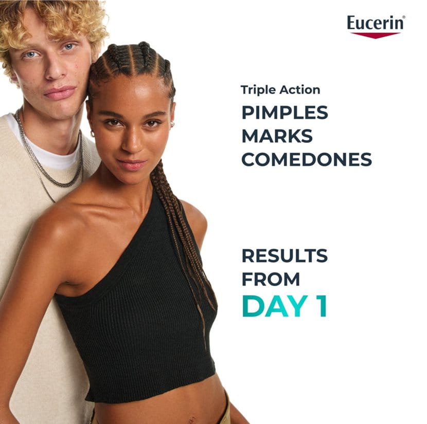 Advertisement for Eucerin with two people standing close together on a white background.