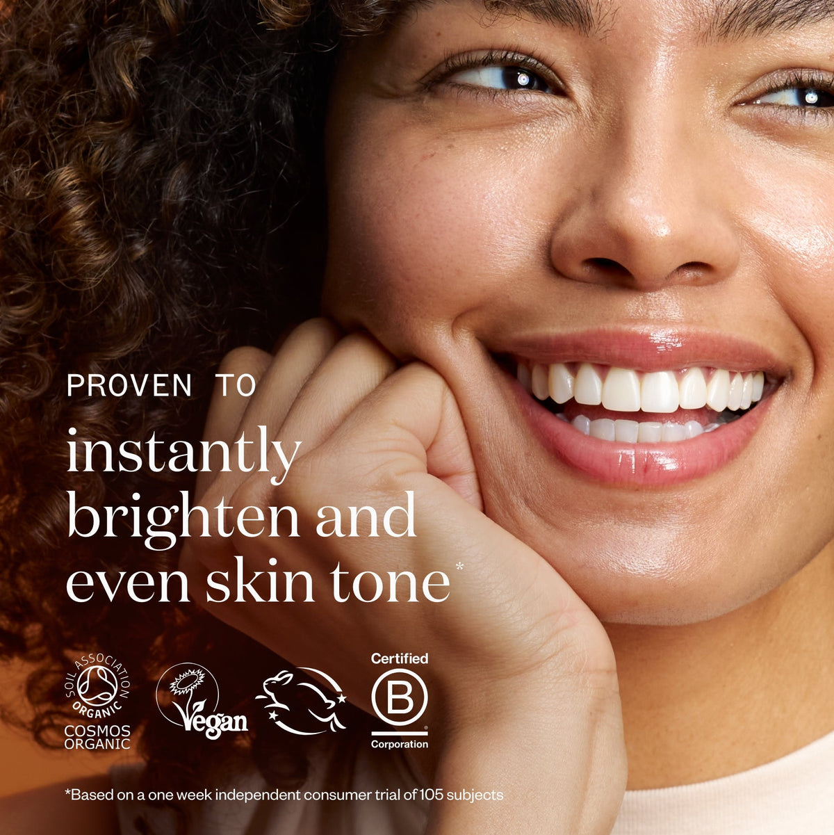 Woman with a radiant smile, text about skin tone improvement, and certification logos.