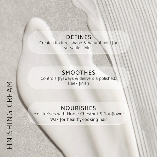 A close-up of a white cream product smear on a light gray textured background with three translucent text boxes describing benefits: Defines, Smoothes, and Nourishes. Vertical text on the left reads FINISHING CREAM.