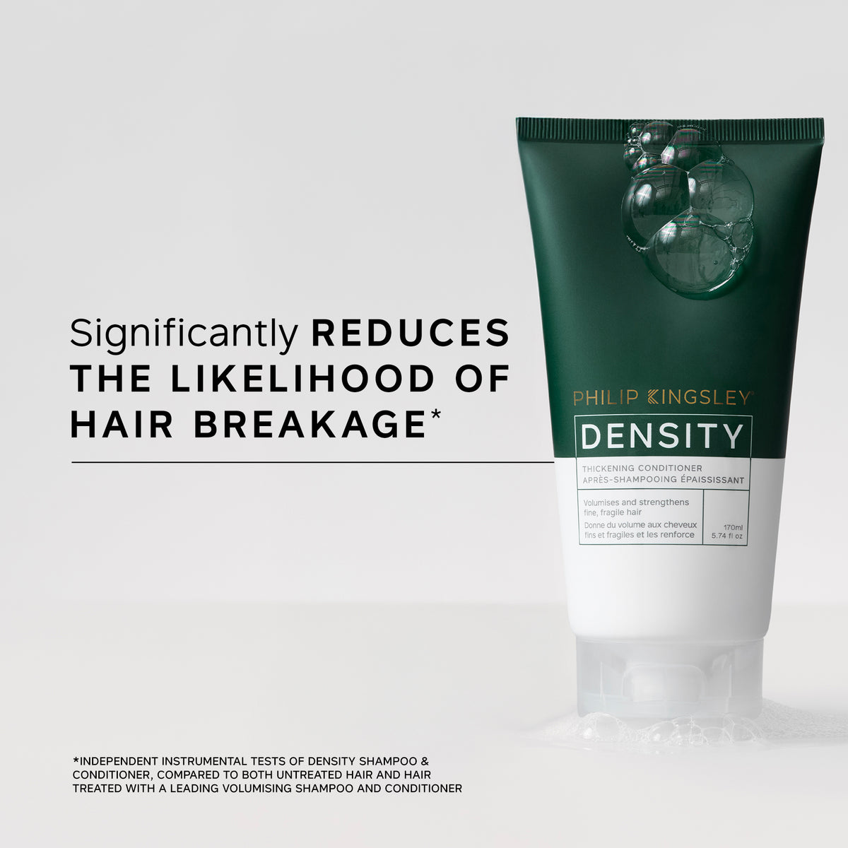 Tube of Philip Kingsley Density product on a light gray background