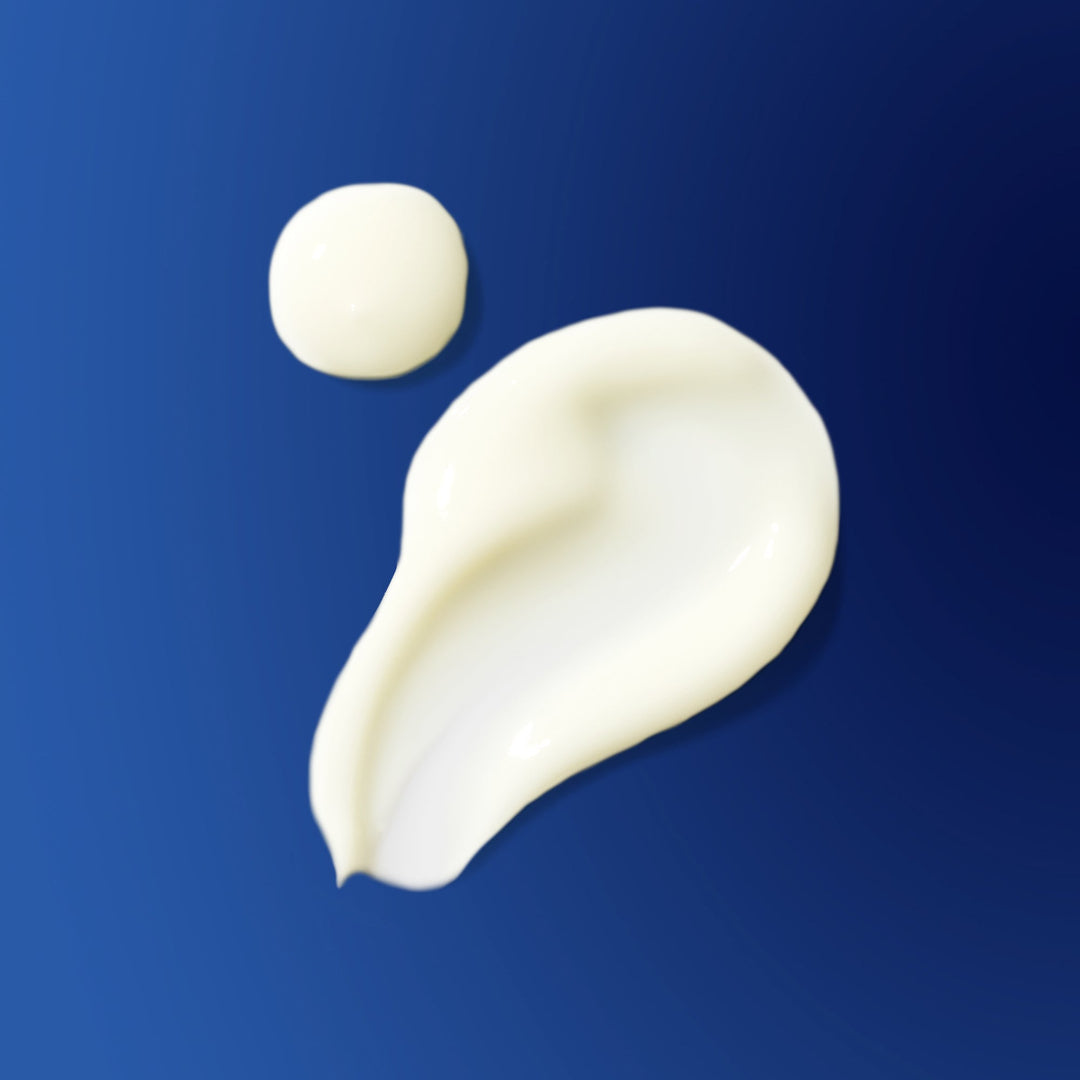 Two swatches of cream on a blue background