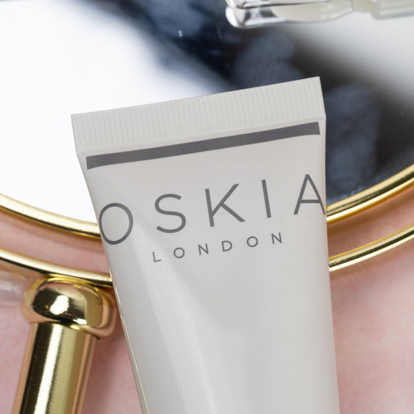 Oskia London skincare product with a blurred background