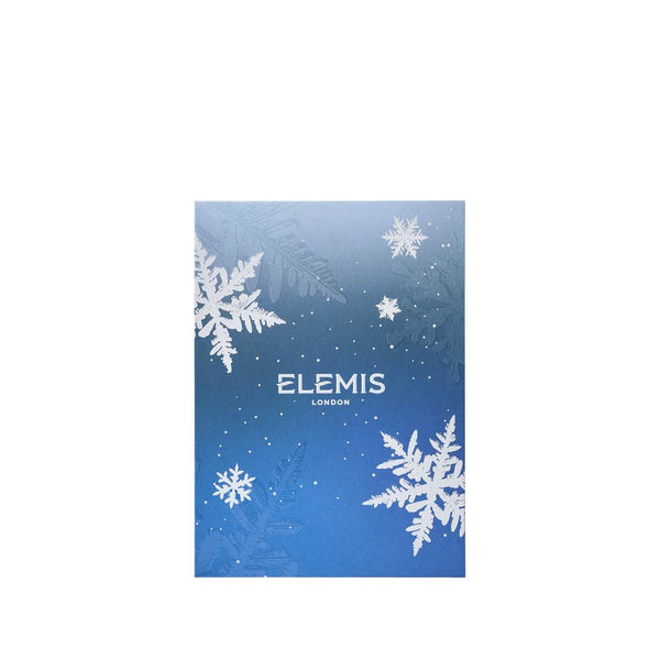 Elemis product packaging with snowflakes on a blue gradient background