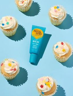 Bondi Sands Lip Balm SPF50+ Sweet Vanilla surrounded by cupcakes