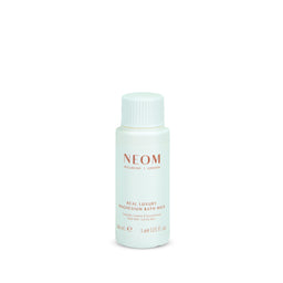 Neom bottle of Real Luxury Magnesium Bath Milk on a white background