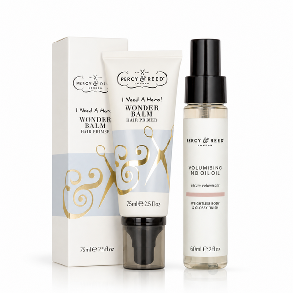 Percy & Reed London hair care set featuring a Wonder Balm Hair Primer tube with its box and a Volumising No Oil Oil bottle, on a white background.