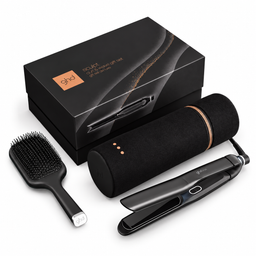 Ghda Squid hair styling gift set including a black flat iron, black paddle brush, and black cylindrical hair dryer cover with metallic rose gold accents, displayed with its black retail box on a white background.