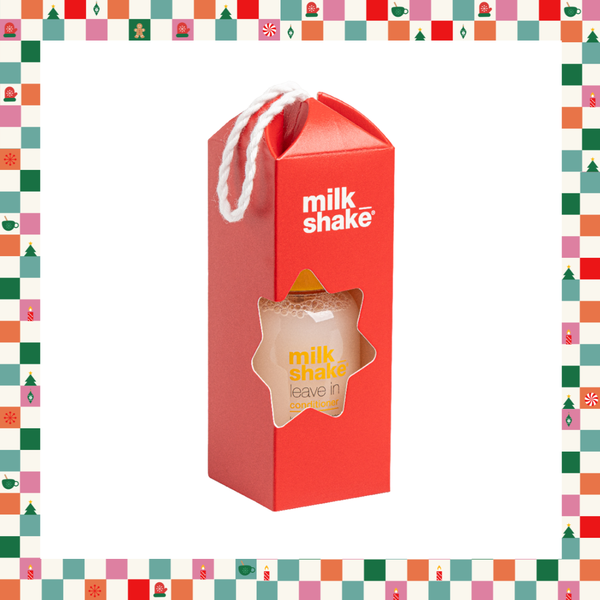 A red milk shake gift box with a white rope handle, featuring a star-shaped window that shows a milk shake inside. The box has the words 'milk shake' printed on it in white and orange.