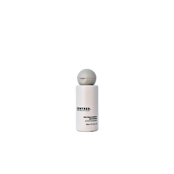 White bottle with a gray cap on a white background