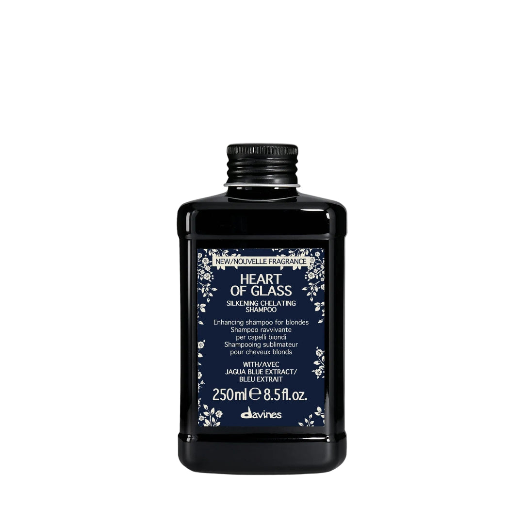 Black shampoo bottle labeled 'Heart of Glass' on a white background