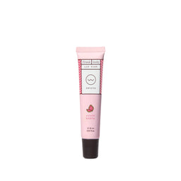 A pink squeeze tube of Frank Body Lip Balm in the 'Juicy Orange' scent, featuring a black cap, centered on a light gray background.