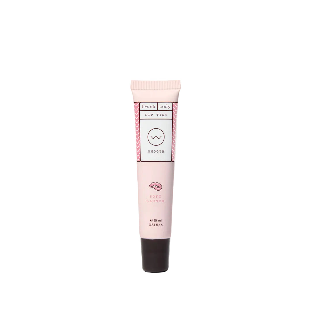 Pink lip balm tube with brand logo on a white background