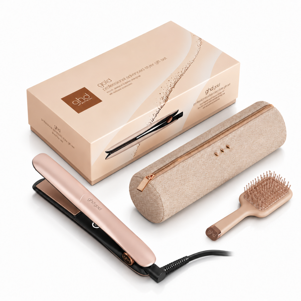 Ghda g20 hair styling set on a white background, including a rose gold flat iron, a beige fabric pouch, a wooden paddle brush, and the original packaging box.