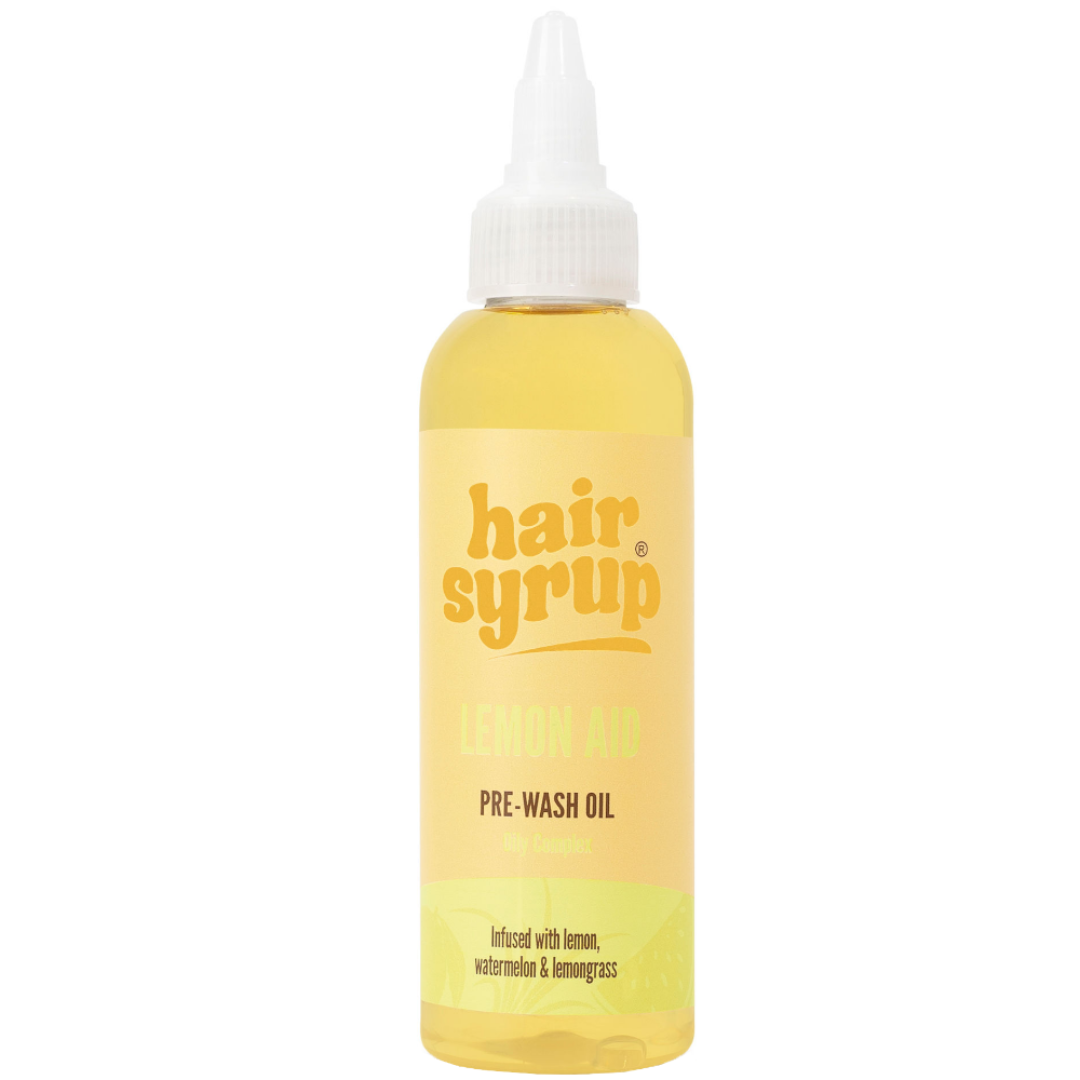 Bottle of hair syrup pre-wash oil on a white background