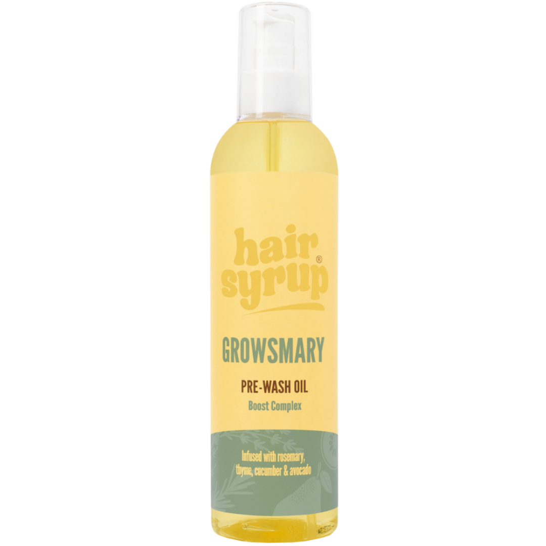Bottle of hair syrup pre-wash oil with yellow label on a white background