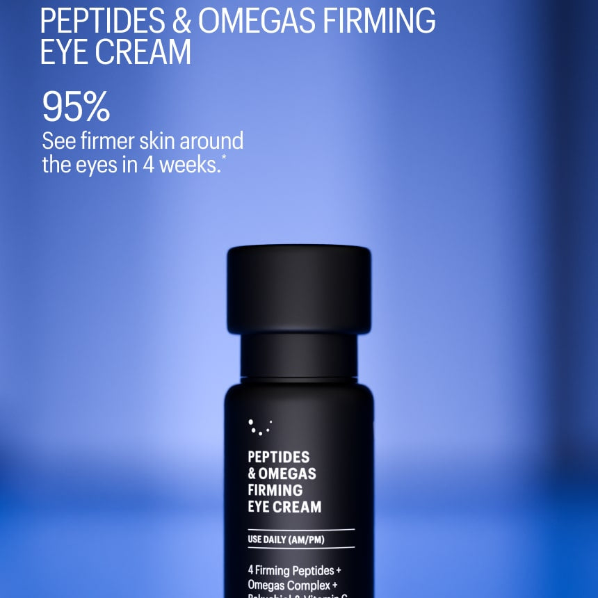 Black eye cream bottle with text on a blue background