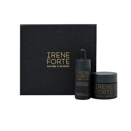 Irene Forte skincare products including a black box, dropper bottle, and jar on a white background.