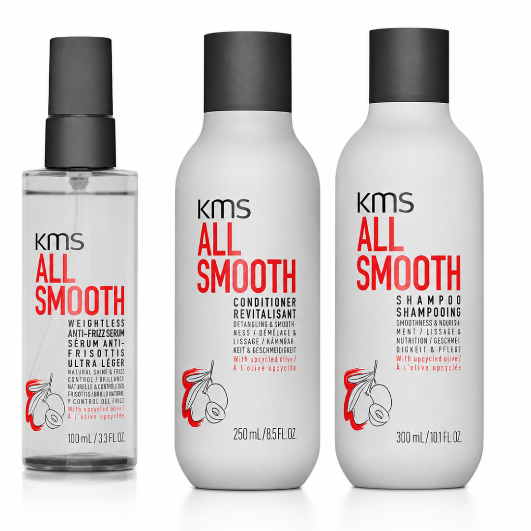 Three KMS All Smooth haircare products on a white background: a clear spray bottle with a black pump, a white conditioner bottle with a black cap, and a white shampoo bottle with a black cap. The labels feature red and black text with a small red hair illustration.