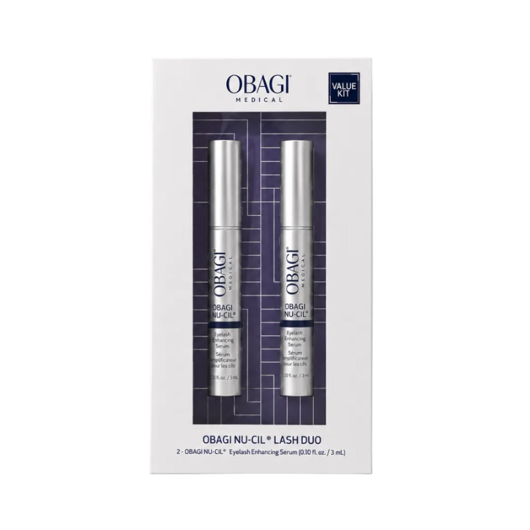 Obagi Medical Value Out Obagi Nu-Cil Lash Duo in a white rectangular box with a clear window showing two silver cosmetic tubes, photographed on a light gray background.