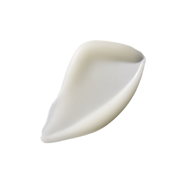A single smooth, teardrop-shaped cream-colored silicone or rubber pad on a solid white background.