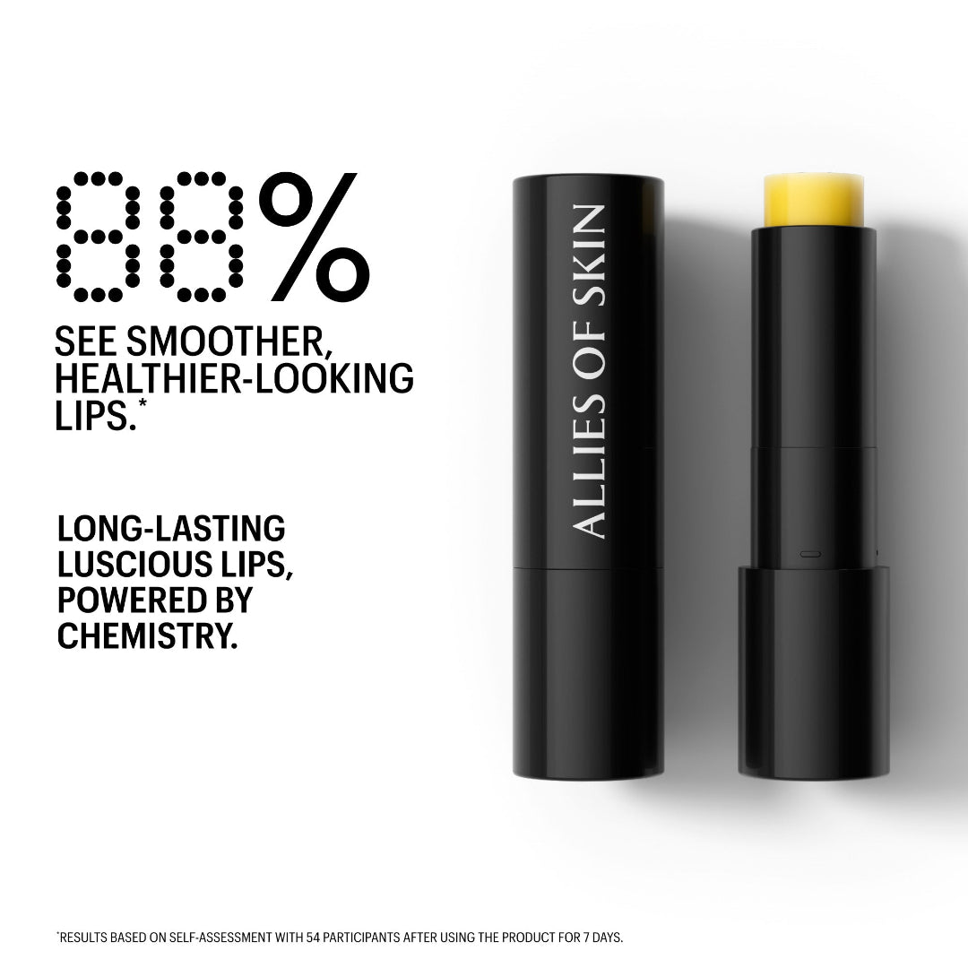 Allies of Skin lip balm shown in a black tube with the cap removed, revealing a yellow balm stick, alongside marketing text on a white background.