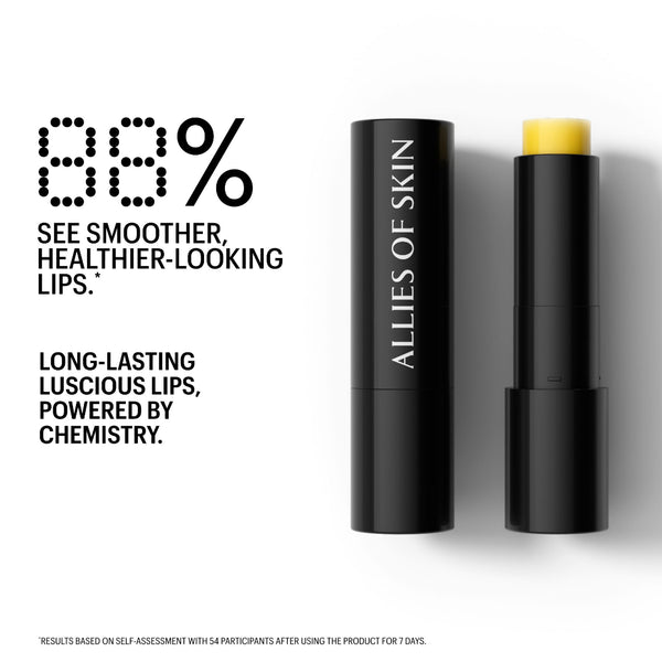 Allies of Skin lip balm shown in a black tube with the cap removed, revealing a yellow balm stick, alongside marketing text on a white background.
