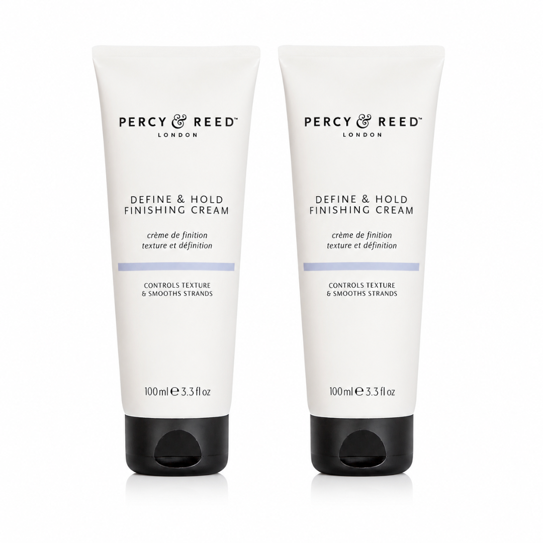 Two white tubes of Percy & Reed Define & Hold Finishing Cream with black caps, displayed side-by-side on a white background.