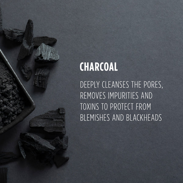 Charcoal pieces and a container on a dark background with text about charcoal's benefits.