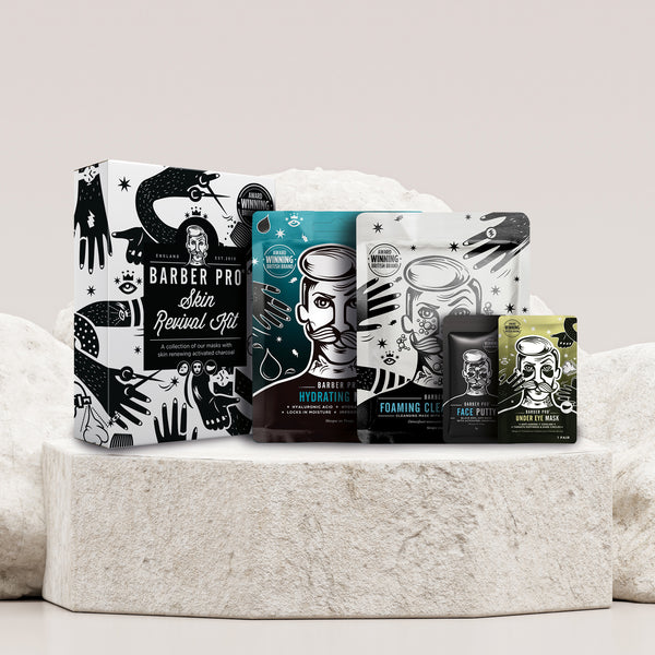 Collection of Barber Pro skincare products on a textured surface