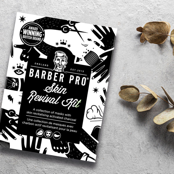 Barber Pro Skin Revival Kit packaging on a gray surface with decorative elements.