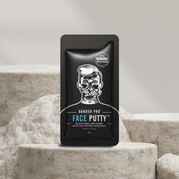 Barber Pro Face Putty packaging on a textured surface with a neutral background