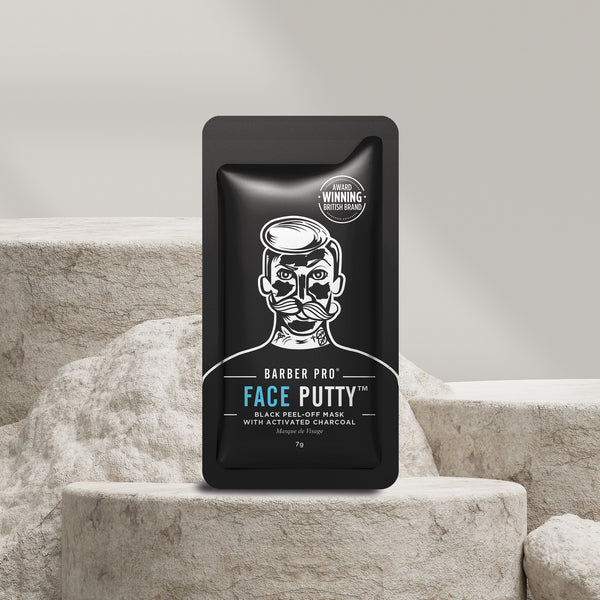 Barber Pro Face Putty packaging on a textured surface with a neutral background