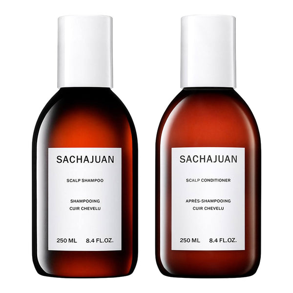 Two bottles of Sachajuan scalp shampoo and conditioner on a white background