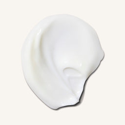 White cream swatch on a light gray background