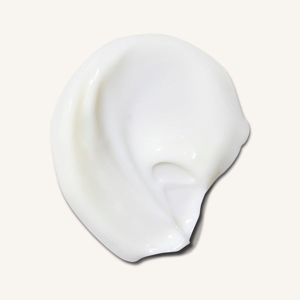 White cream swatch on a light gray background