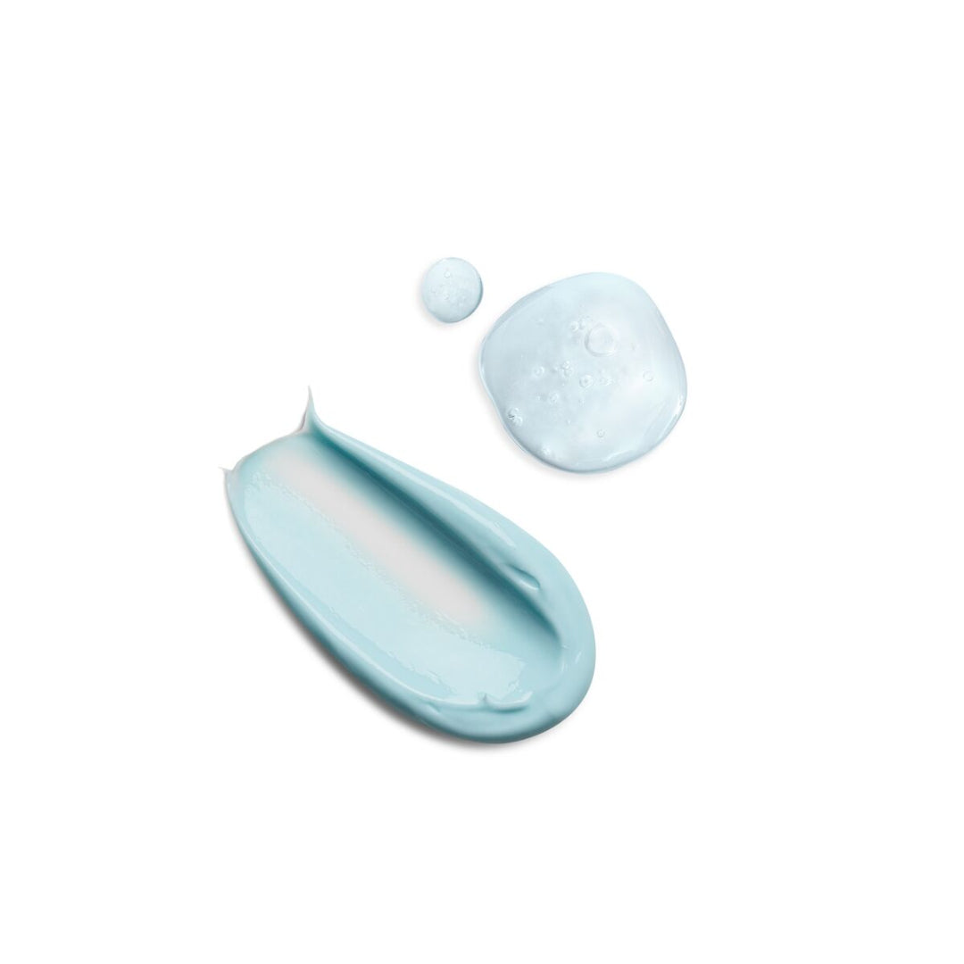 Blue skincare product with a smear and droplet on a white background