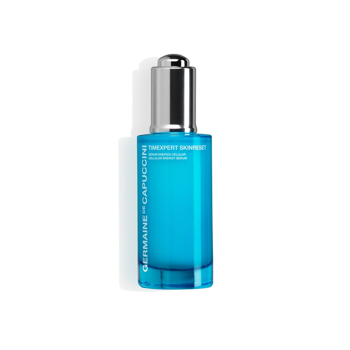 Blue skincare serum bottle with silver cap on a white background