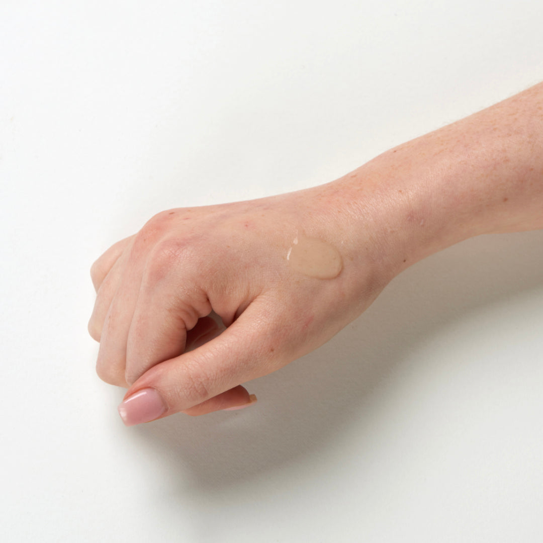 Ultrasun Sports Gel SPF 50 200ml being applied to hand